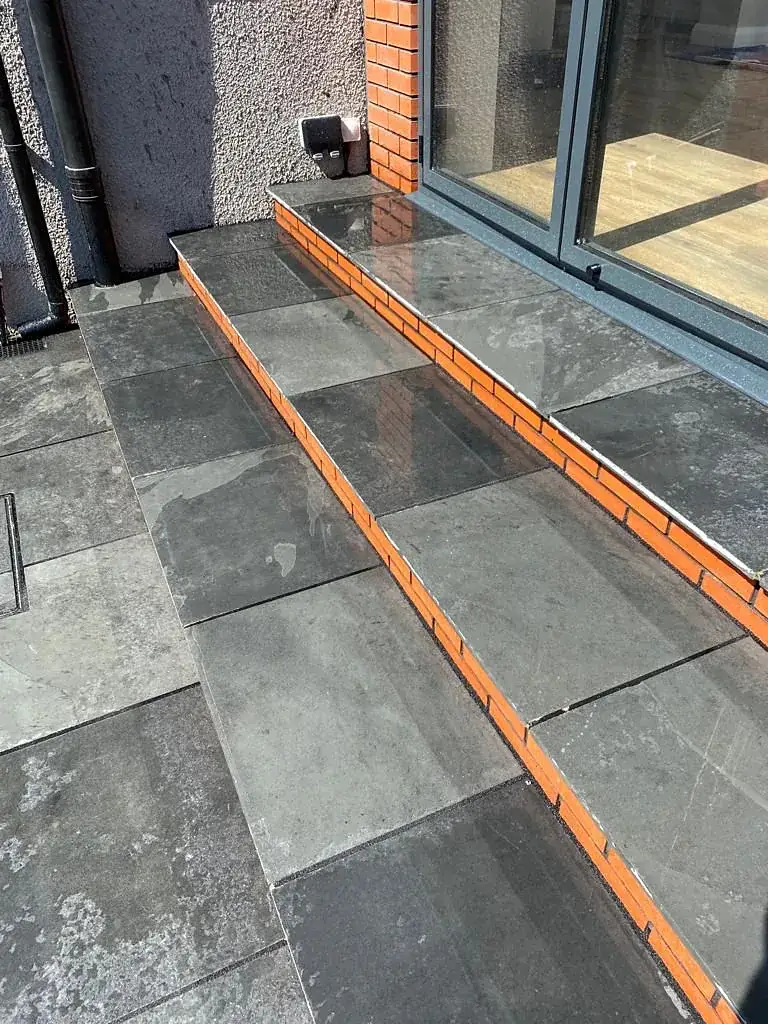 Paving set out with guide lines before the final slabs are laid
